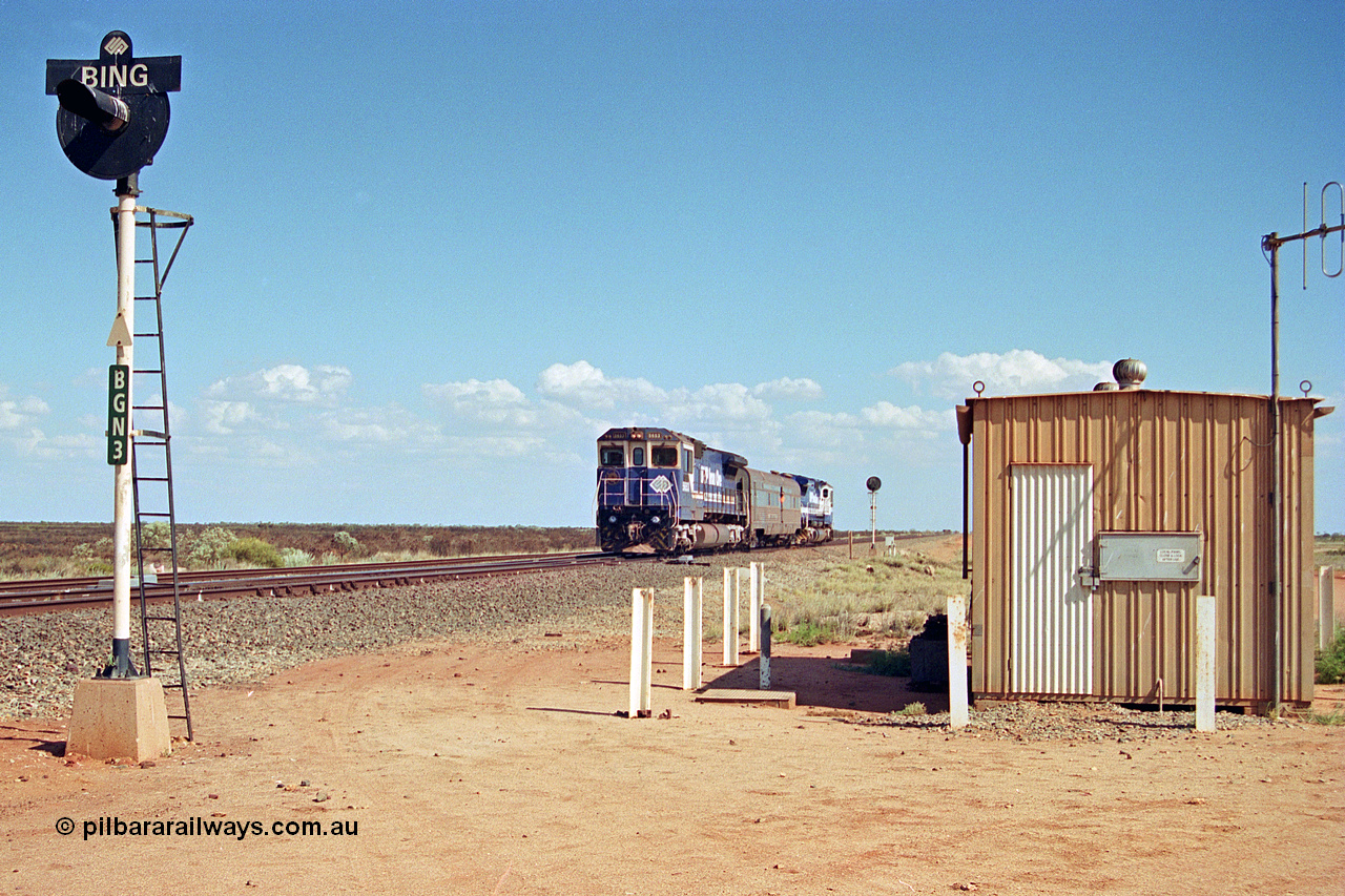 269-15
Bing North and the Alstom 25-year service agreement special led by BHP Iron Ore's Goninan GE rebuild CM40-8M unit 5653 'Chiba' serial number 8412-10 / 93-144 heads back to Nelson Point with The Sundowner and 5634 on the rear of the train. Friday 12th of April 2002.
Keywords: 5653;Goninan;GE;CM40-8M;8412-10/93-144;rebuild;AE-Goodwin;ALCo;M636C;5484;G6061-5;