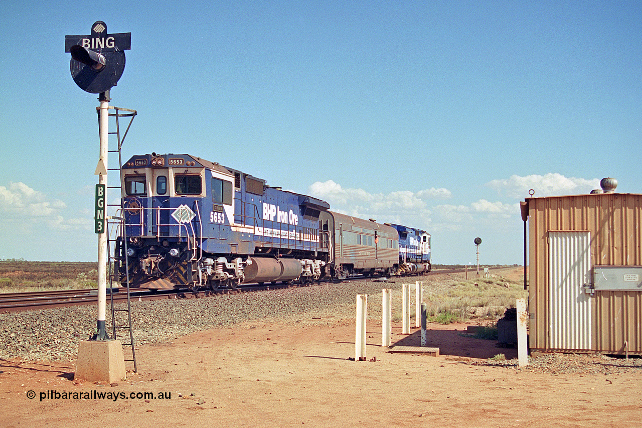 269-18
Bing North and the Alstom 25-year service agreement special led by BHP Iron Ore's Goninan GE rebuild CM40-8M unit 5653 'Chiba' serial number 8412-10 / 93-144 heads back to Nelson Point with The Sundowner and 5634 on the rear of the train. Friday 12th of April 2002.
Keywords: 5653;Goninan;GE;CM40-8M;8412-10/93-144;rebuild;AE-Goodwin;ALCo;M636C;5484;G6061-5;