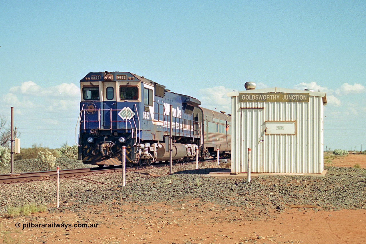 269-21
Goldsworthy Junction, and the Alstom 25-year service agreement special led by BHP Iron Ore's Goninan GE rebuild CM40-8M unit 5653 'Chiba' serial number 8412-10 / 93-144 heads back to Nelson Point with The Sundowner and 5634 on the rear of the train. Friday 12th of April 2002.
Keywords: 5653;Goninan;GE;CM40-8M;8412-10/93-144;rebuild;AE-Goodwin;ALCo;M636C;5484;G6061-5;