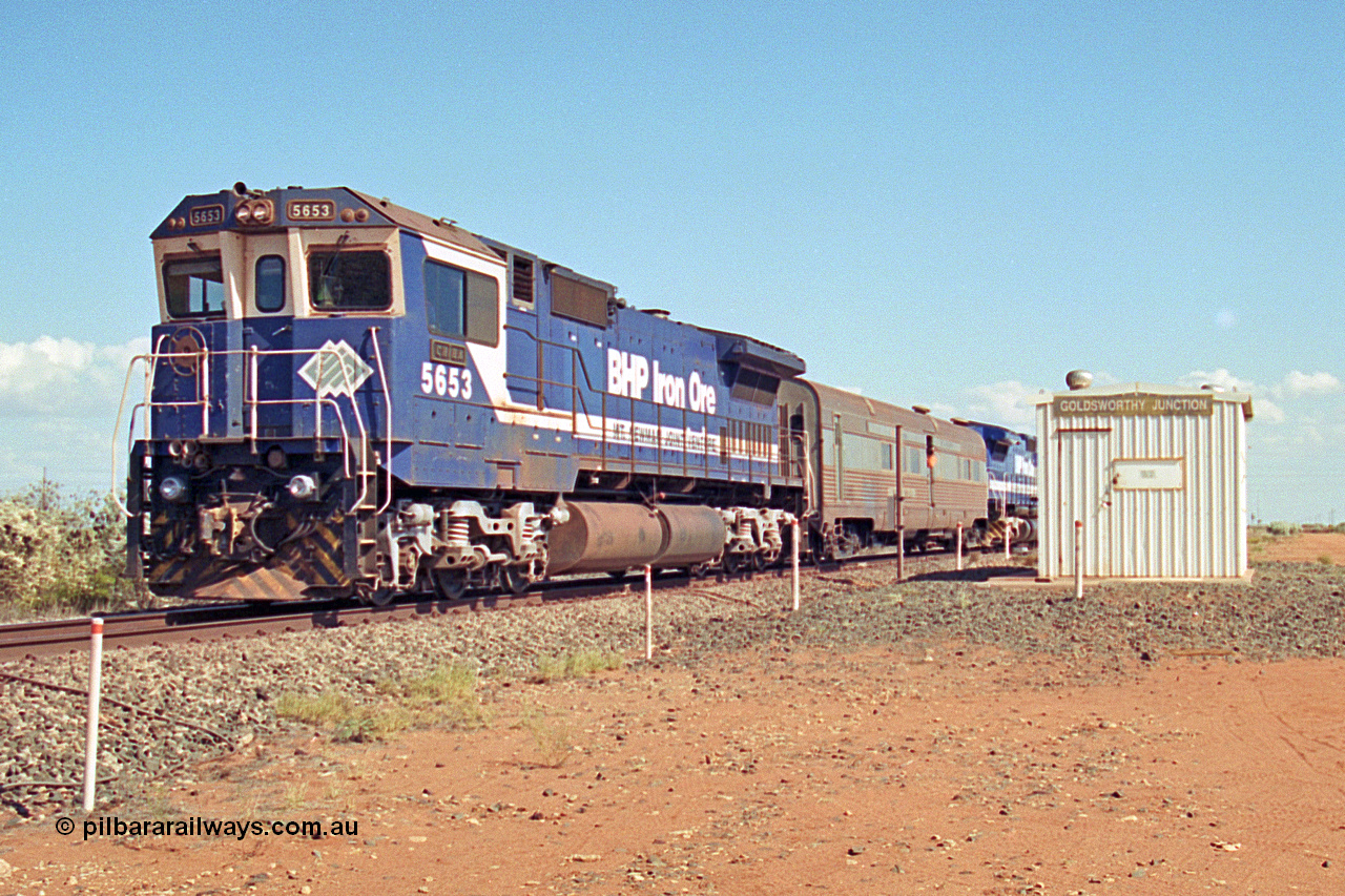 269-23
Goldsworthy Junction, and the Alstom 25-year service agreement special led by BHP Iron Ore's Goninan GE rebuild CM40-8M unit 5653 'Chiba' serial number 8412-10 / 93-144 heads back to Nelson Point with The Sundowner and 5634 on the rear of the train. Friday 12th of April 2002.
Keywords: 5653;Goninan;GE;CM40-8M;8412-10/93-144;rebuild;AE-Goodwin;ALCo;M636C;5484;G6061-5;