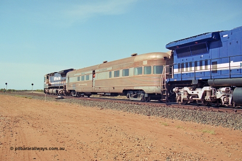 269-25
Goldsworthy Junction, and the Alstom 25-year service agreement special led by BHP Iron Ore's Goninan GE rebuild CM40-8M unit 5653 'Chiba' serial number 8412-10 / 93-144 heads back to Nelson Point with The Sundowner and 5634 on the rear of the train. Friday April 12, 2002.
Keywords: Silver-Star;EG-Budd;Sundowner;General-Pershing-Zephyr;301;