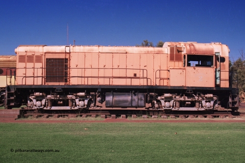 275-32
Port Hedland, Don Rhodes Mining Museum, preserved Goldsworthy Mining B class unit #2 serial number A-105, these units of Bo-Bo design with a 6CSRKT 640 kW prime mover were built at the English Electric Rocklea Qld plant in 1965 and primarily used for the construction of the Goldsworthy to Finucane Island railway, then ore trains and then the daily supply train once the A class arrived. August 10, 2003.
Keywords: 2;B-class;English-Electric-Qld;ST95B;A-105;GML;Goldsworthy-Mining;