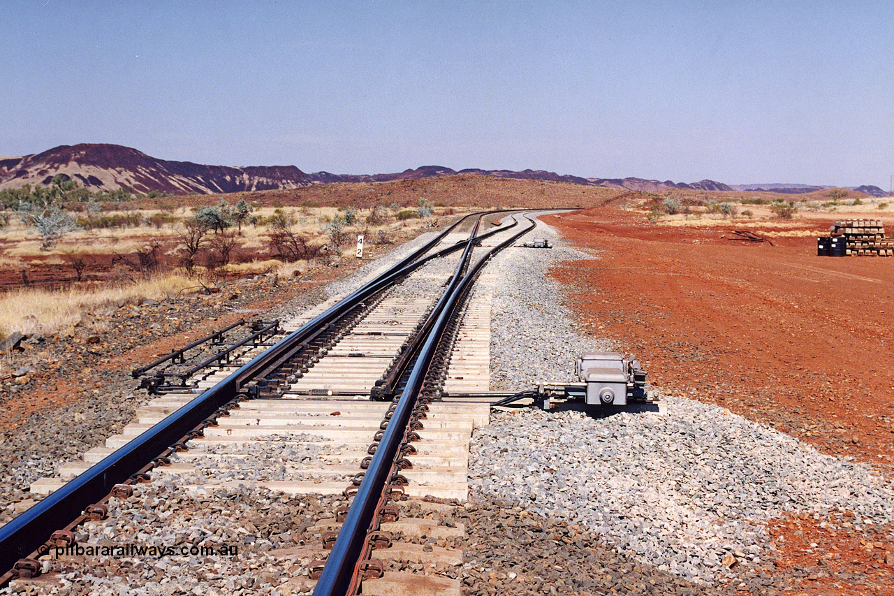 283-11
Harding Siding on the Robe River line at the 42 kilometre post looking in the down direction towards Deepdale. Recently extended north end of the siding to accommodate the soon to be West Angelas traffic and longer trains. 22nd of May 2002.
