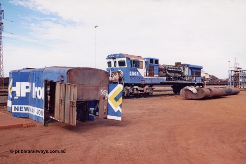 283-07
Nelson Point, BHP 's retired Goninan ALCo to GE rebuild C36-7M unit 5508 serial number 4839-04 / 87-073 is being prepared for road transport to Goninan in Perth. It will go on to be rebuilt and leased to Rio Tinto as 5052. May 2002.
Keywords: 5508;Goninan;GE;C36-7M;4839-04/87-073;rebuild;AE-Goodwin;ALCo;C636;5466;G6041-2;