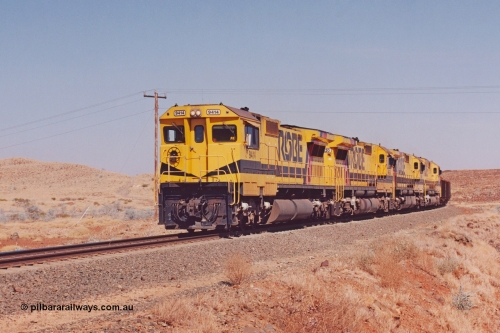 283-16
At the 45.4 km grade crossing on the Robe River line, loaded train easers around the curve behind the standard quad Goninan CM40-8M units led by 9414 serial number 8206-11 / 91-124 and rebuilt from the final of the original five ALCo units ordered from construction. May 22, 2002.
Keywords: 9414;Goninan;GE;CM40-8M;8206-11/91-124;rebuild;AE-Goodwin;ALCo;M636;G6060-5;