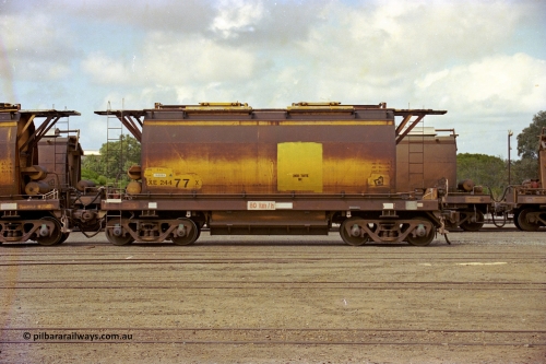 284-06
Narngulu yard, XE type hopper waggon XE 24477 built by Westrail Midland Workshops in 1976 as part of a batch of forty-one waggons for ilmenite cartage, seen here labelled for zircon traffic. November 8, 2004.
Keywords: XE-type;XE24477;Westrail-Midland-WS;