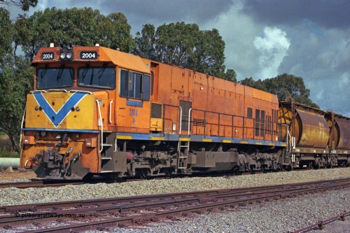 284-17
Narngulu, Geraldton, former Westrail P class loco P 2004 'Shire of Dalwallinu' built by Goninan WA as a GE CM25-8 model with serial number 6320-12 / 90-099 sits in the yard on empty mineral sand train waiting to run to Eneabba. November 9, 2004.
Keywords: P-class;P2004;Goninan-WA;GE;CM25-8;6320-03/90-089;