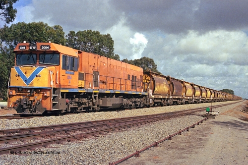 284-18
Narngulu, Geraldton, former Westrail P class loco P 2004 'Shire of Dalwallinu' built by Goninan WA as a GE CM25-8 model with serial number 6320-12 / 90-099 sits in the yard on empty mineral sand train waiting to run to Eneabba. November 9, 2004.
Keywords: P-class;P2004;Goninan-WA;GE;CM25-8;6320-03/90-089;
