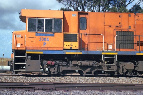 284-20
Narngulu, Geraldton, former Westrail P class loco P 2004 'Shire of Dalwallinu' built by Goninan WA as a GE CM25-8 model with serial number 6320-12 / 90-099 sits in the yard on empty mineral sand train waiting to run to Eneabba. November 9, 2004.
Keywords: P-class;P2004;Goninan-WA;GE;CM25-8;6320-03/90-089;