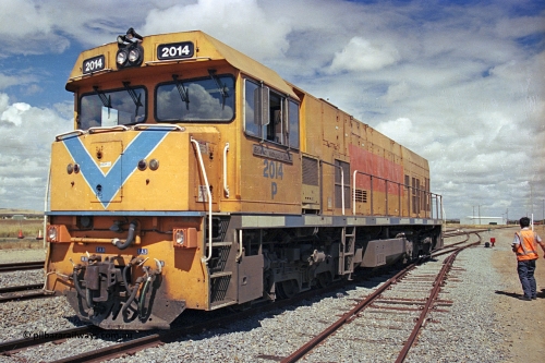 284-25
Narngulu, Geraldton, former Westrail P class loco P 2014 'Shire of Wongan-Ballidu' built by Goninan WA as a GE CM25-8 model with serial number 6320-12 / 90-099 sits in the yard in-between shunt movements. November 10, 2004.
Keywords: P-class;P2014;Goninan-WA;GE;CM25-8;6320-12/90-099;