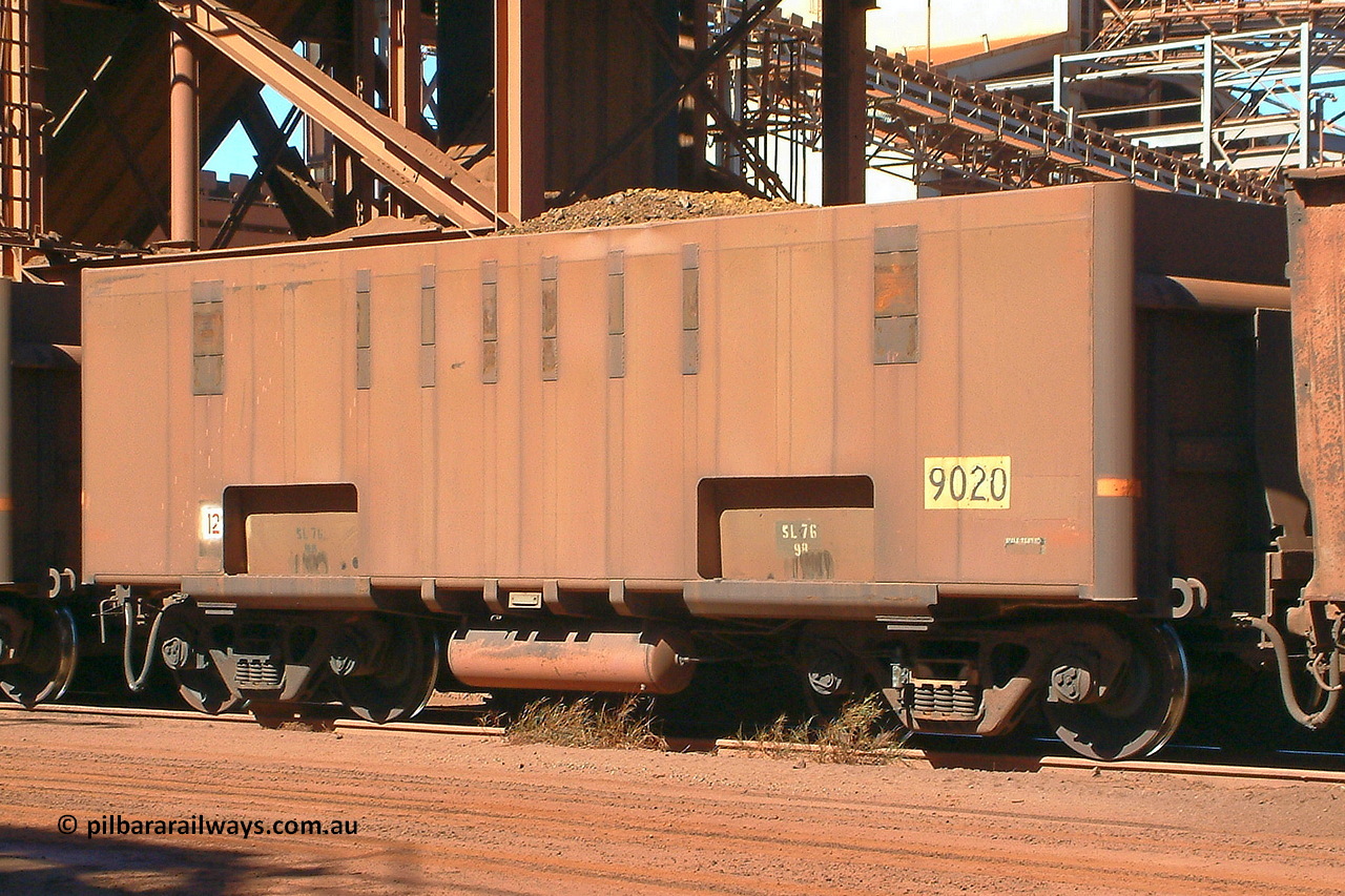 030712 142923
Nelson Point, empty BHP ore waggon 9020, the prototype leader originally built by Comeng in Mittagong NSW as a part of seven prototype ore waggons made from low carbon 301 stainless steel with an higher volume and aerodynamic flat sides and were bogieless with four independent radial wheel sets. Of the seven waggon, the first four had a flat floor and final three had a drop belly floor. The radial wheel sets were later replaced with conventional bogies. 12th of July 2003.
Keywords: 9020;Comeng-NSW;BHP-ore-waggon;