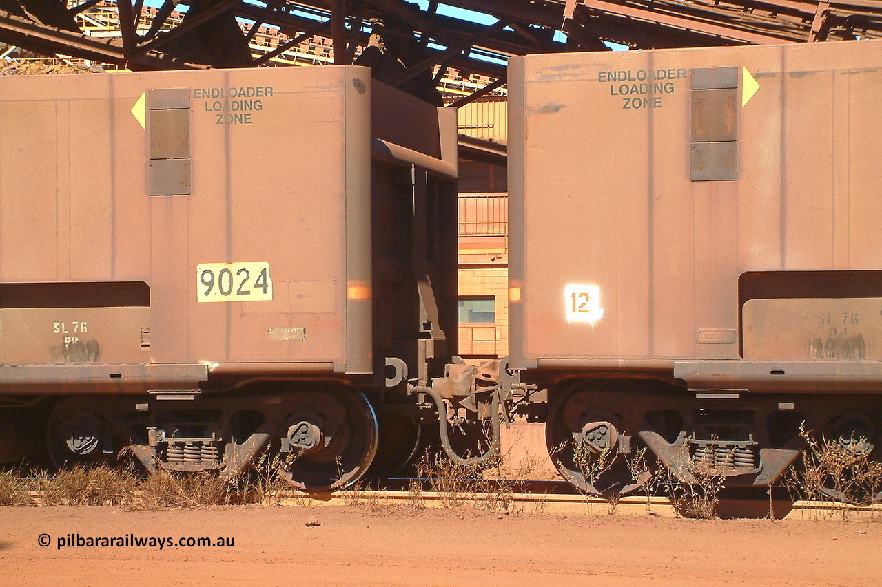 030712 143247
Nelson Point, empty BHP ore waggon 9024, originally built by Comeng in Mittagong NSW as a part of seven prototype ore waggons made from low carbon 301 stainless steel with an higher volume and aerodynamic flat sides and were bogieless with four independent radial wheel sets. Of the seven waggon, the first four had a flat floor and final three had a drop belly floor. The radial wheel sets were later replaced with conventional bogies. This view shows the reduced gap between waggons reduced from 1084 to 934 mm to aid the aerodynamics. 12th of July 2003.
Keywords: 9024;Comeng-NSW;BHP-ore-waggon;