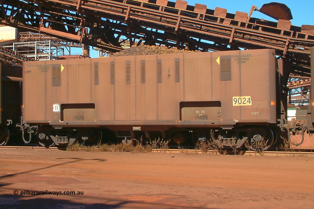 030712 143256
Nelson Point, empty BHP ore waggon 9024 with drop belly floor, originally built by Comeng in Mittagong NSW as a part of seven prototype ore waggons made from low carbon 301 stainless steel with an higher volume and aerodynamic flat sides and were bogieless with four independent radial wheel sets. Of the seven waggon, the first four had a flat floor and final three had a drop belly floor. The radial wheel sets were later replaced with conventional bogies. 12th of July 2003.
Keywords: 9024;Comeng-NSW;BHP-ore-waggon;