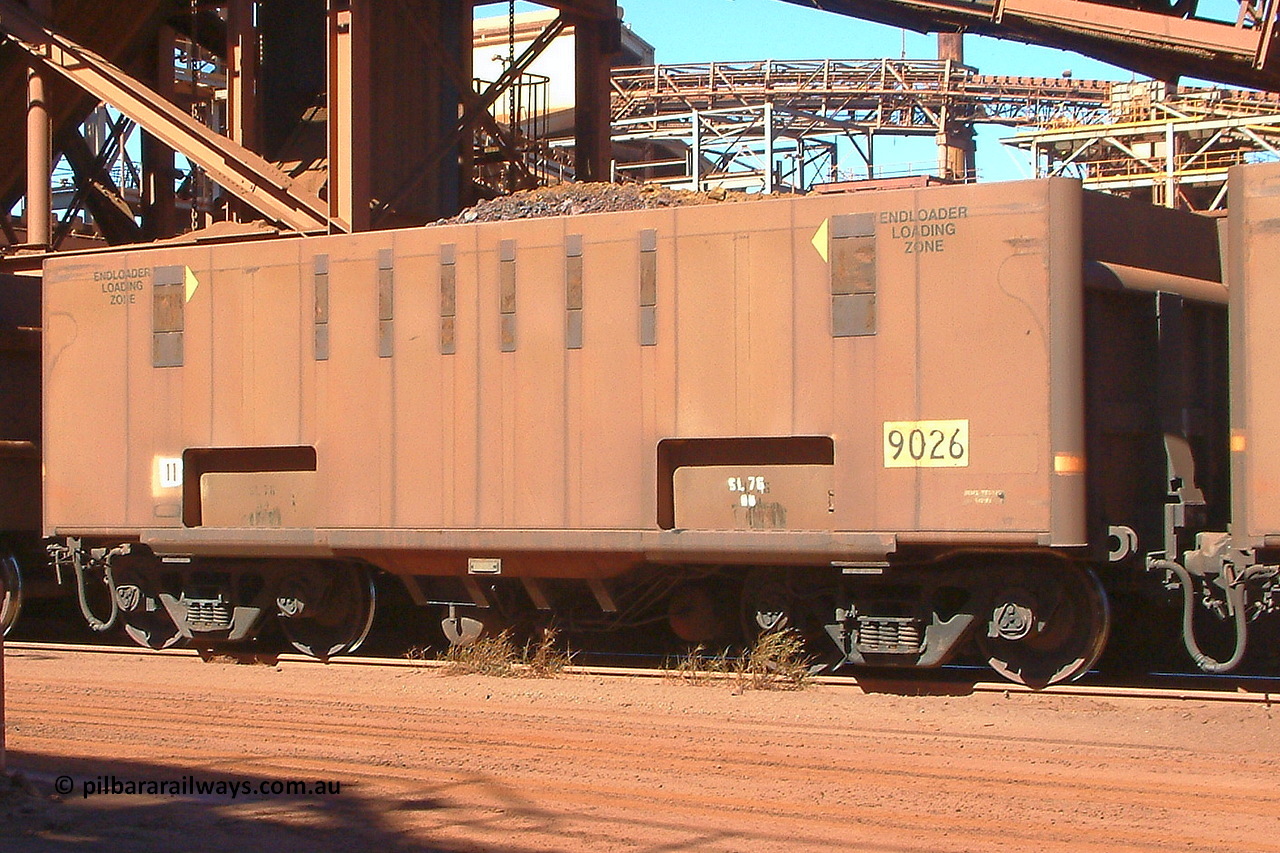 030712 143315
Nelson Point, empty BHP ore waggon 9026 with drop belly floor, originally built by Comeng in Mittagong NSW as a part of seven prototype ore waggons made from low carbon 301 stainless steel with an higher volume and aerodynamic flat sides and were bogieless with four independent radial wheel sets. Of the seven waggon, the first four had a flat floor and final three had a drop belly floor. The radial wheel sets were later replaced with conventional bogies. 12th of July 2003.
Keywords: 9026;Comeng-NSW;BHP-ore-waggon;