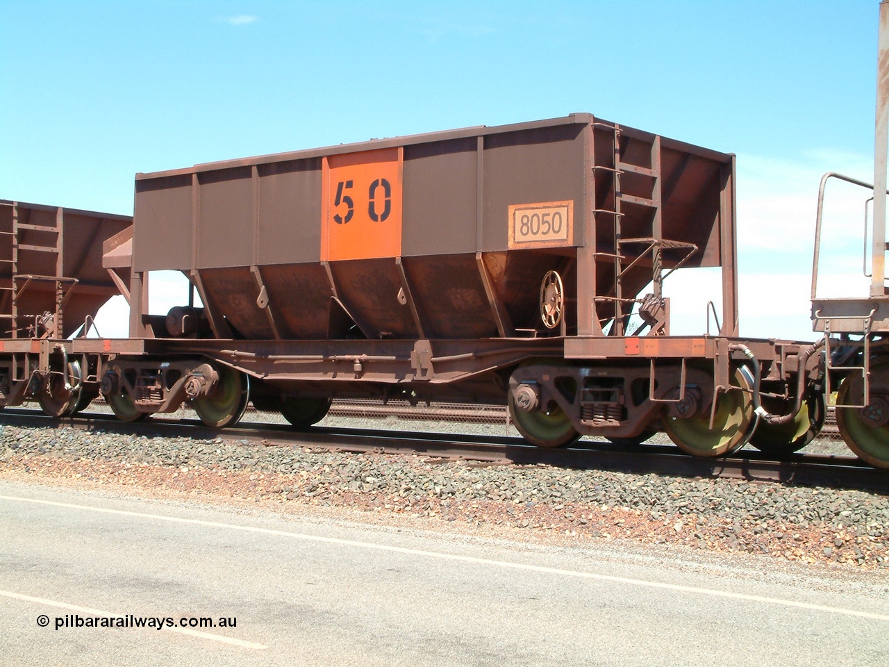 040409 123052
Boodarie, Goldsworthy service bottom discharge Tomlinson Steel WA built ore waggon 8050. 9th April 2004.
Keywords: 8050;Tomlinson-Steel-WA;GML-waggon;BHP-ore-waggon;