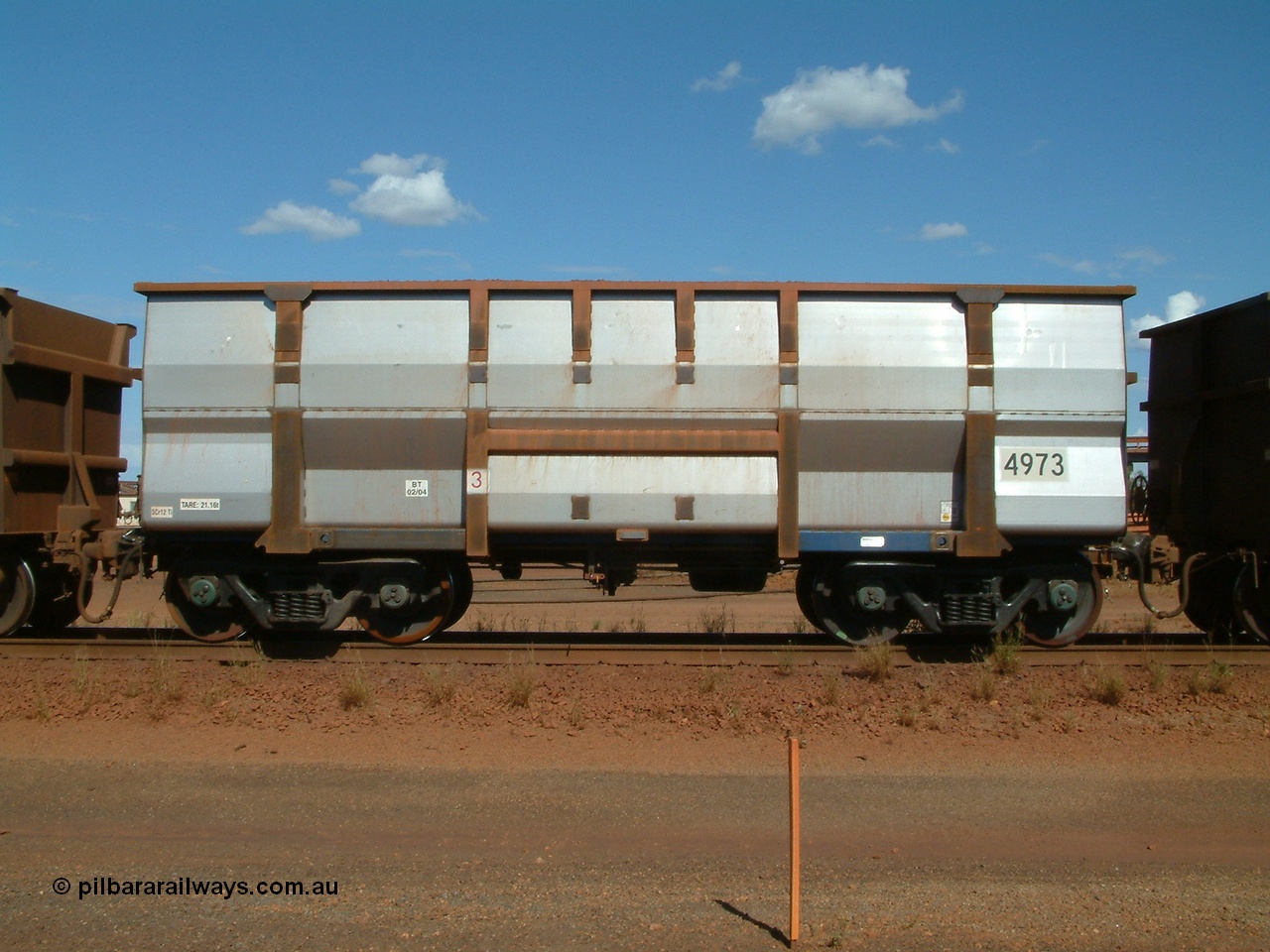 040412 143652
Nelson Point, Goninan built, Lynx Engineering designed ore waggon 4973 made from 5Cr12Ti stainless steel these waggons are known as Golynx waggons, asset number 2032597 with build date 02/2004. 12th April 2004.
Keywords: 4973;Goninan-WA;Golynx;BHP-ore-waggon;