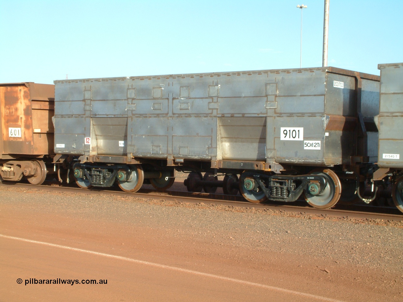 041225 064634
Nelson Point Ore Car Repair Shops, brand new Bradken NSW built ore waggon 9101 asset number 2031703. These waggons are the latest additions to the fleet with 20 on order in total. They are made from the same 5Cr12Ti steel that the Goninan Golynx waggons are made. 25th December 2004.
Keywords: 9101;Bradken-NSW;BHP-ore-waggon;