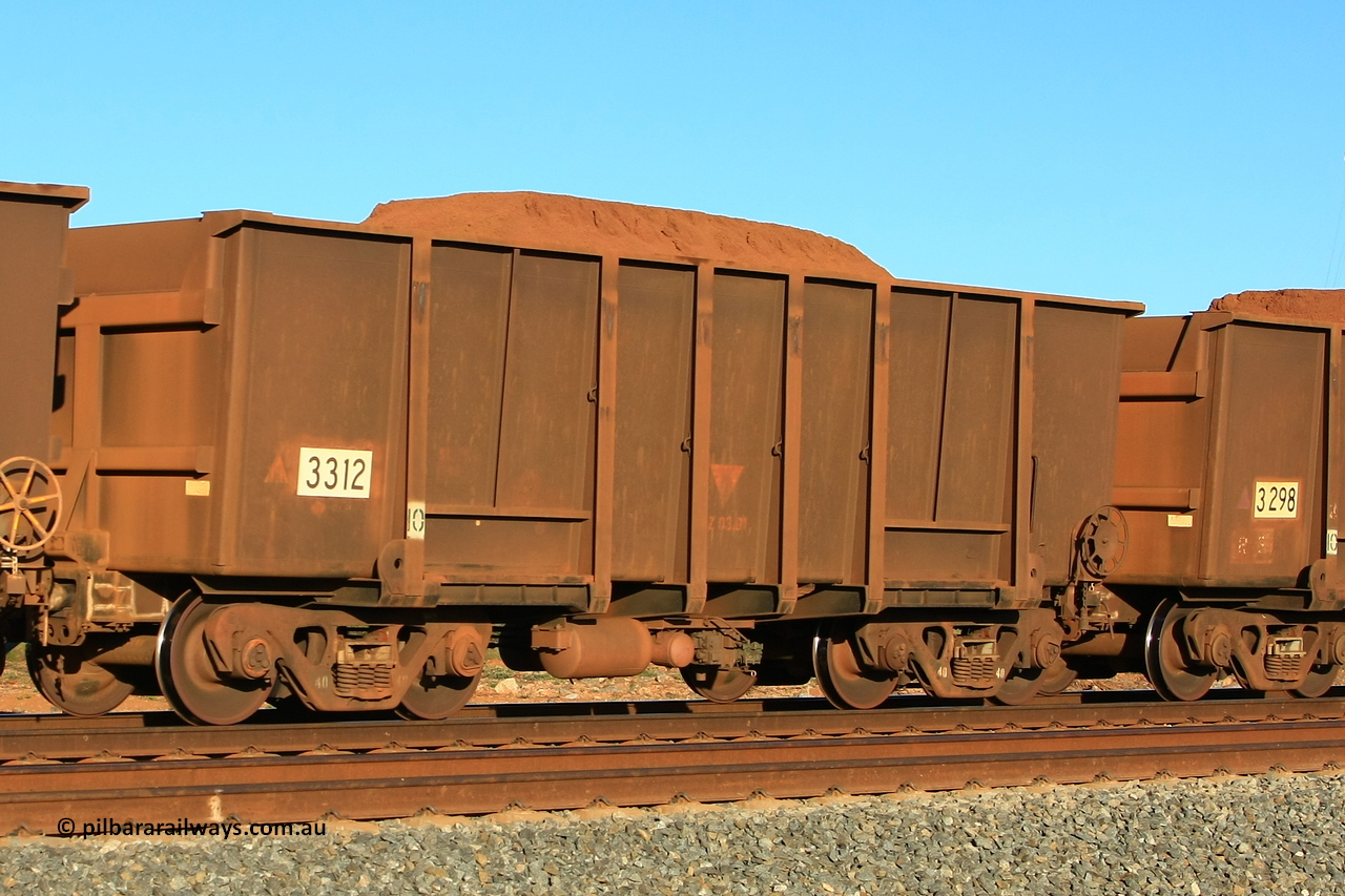 110620 2393r
Walla, loaded BHP ore waggon 3312, one of three hundred and fifty waggons built by Astra Vagoane in Arad Romania in 1988 under a deal with Lang Hancock and waggons for ore arrangement. Only sixty-six entered service. A feature is the fully round 'corners' and side joins. 20th of June 2011.
Keywords: 3312;Astra-Vagoane-Arad-Romania;BHP-ore-waggon;