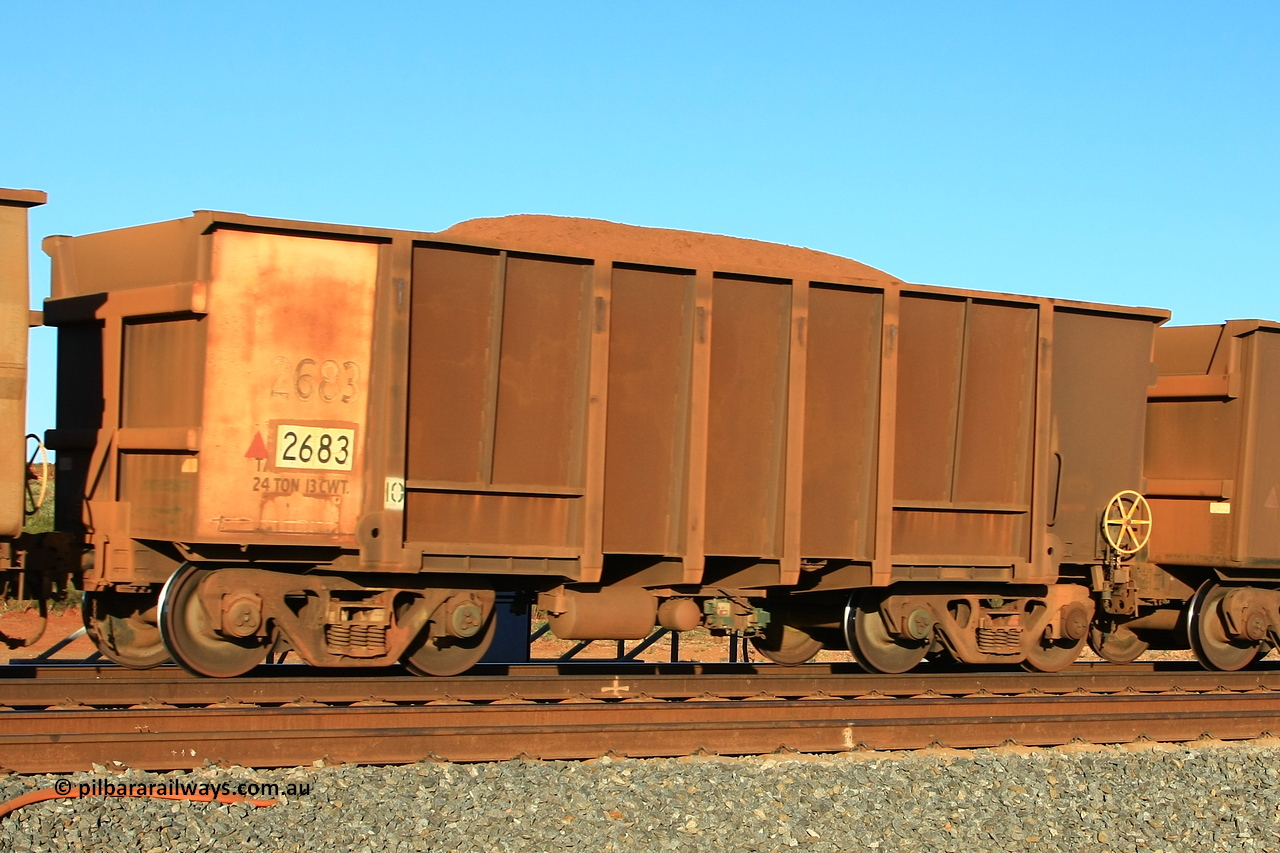 110620 2456r
Walla, loaded BHP ore waggon 2683, originally built in 1971 by Comeng WA as part of a batch of four hundred waggons. The walls in the ribs have been resheeted. Still has the original white end for rotary coupler, original number and weight. 20th of June 2011.
Keywords: 2683;Comeng-WA;BHP-ore-waggon;