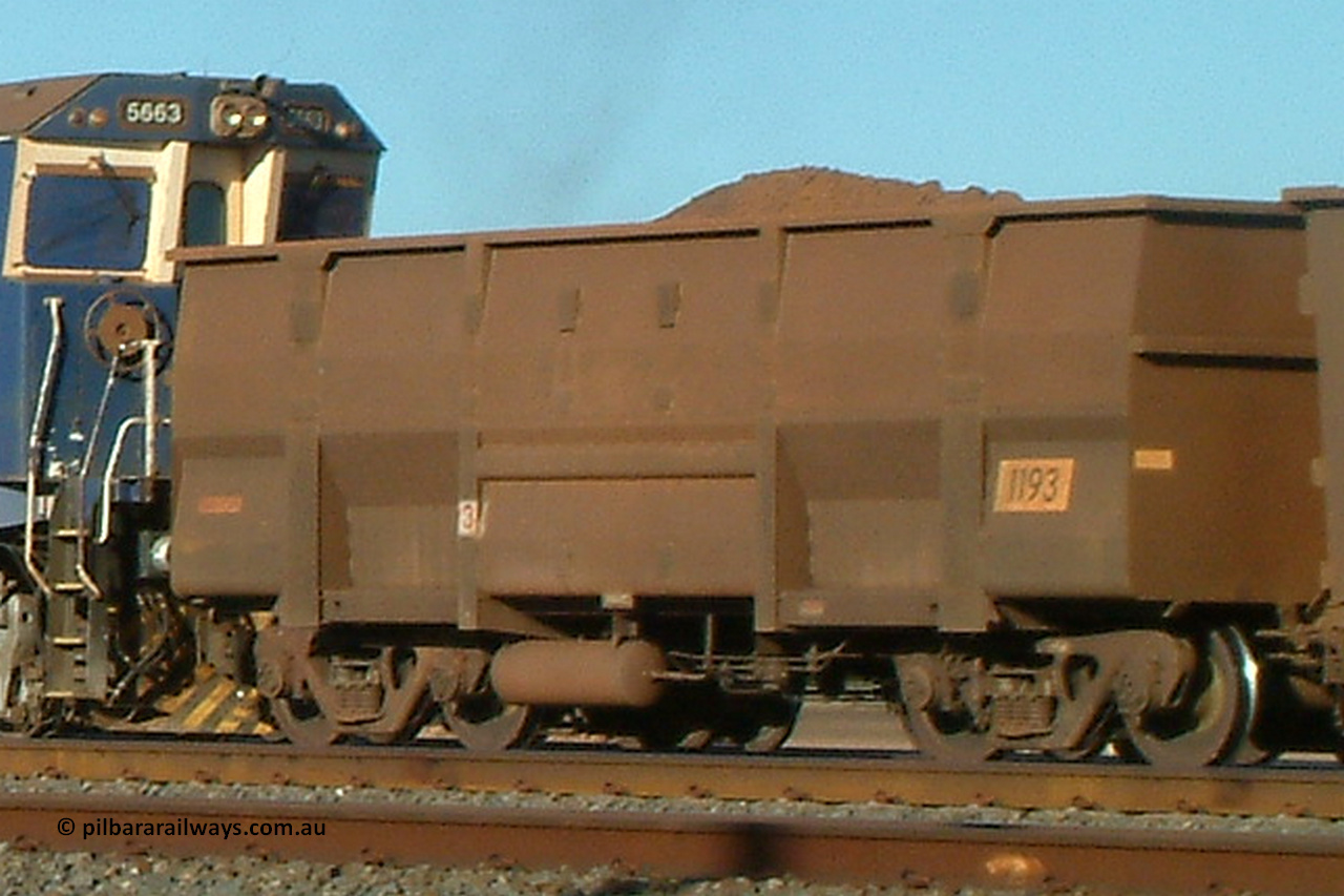 1193 Goninan 040802 080804
Nelson Point, loaded BHP ore waggon 1193, a Goninan replacement Golynx body style from 3Cr12 stainless steel from a 2001-02 build of 345 replacement bodies. August 2, 2004.
Keywords: 1193;Goninan-WA;BHP-ore-waggon;