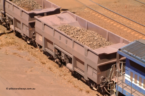 8415 Goninan 040912 132238
Nelson Point, view from above of BHP ore waggon 8415 showing the internal plates fitted for the bottom discharge arrangement of the Goninan WA build of the Golynx design built in November 2001 as a bottom discharge waggon for Goldsworthy service with serial number 950088-345. September 12, 2004.
Keywords: 8415;Goninan-WA;Golynx;BHP-ore-waggon;