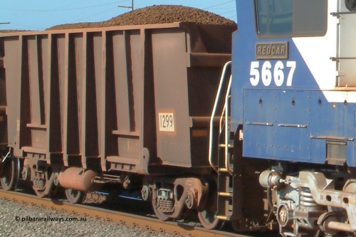 1299 Comeng 041001 153228
Redbank, loaded BHP Iron Ore waggon 1299, a Comeng WA original build from 1971, looks to have been partly resheeted. October 1, 2004.
Keywords: 1299;Comeng-WA;BHP-ore-waggon;