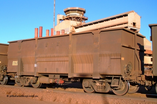 2063 Goninan 040815 165436
Nelson Point, Car Dumper 3, empty BHP Iron Ore waggon 2063, a Goninan WA build in a batch of 345 and the first Golynx builds, serial number 950088-190 built in April 2001. August 15, 2004.
Keywords: 2063;Goninan-WA;BHP-ore-waggon;