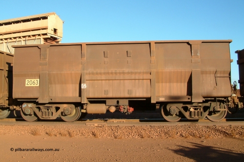 2063 Goninan 040815 165452
Nelson Point, Car Dumper 3, empty BHP Iron Ore waggon 2063, a Goninan WA build in a batch of 345 and the first Golynx builds, serial number 950088-190 built in April 2001. August 15, 2004.
Keywords: 2063;Goninan-WA;BHP-ore-waggon;