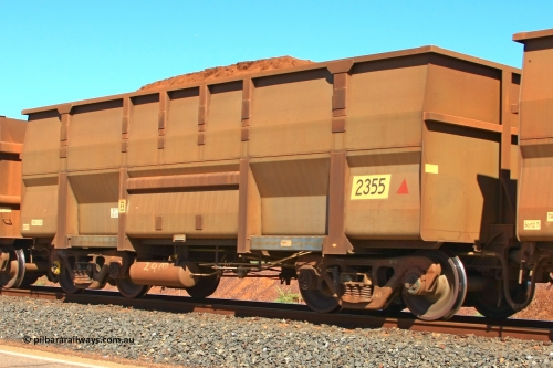 2355 UG 110414 0111
Boodarie, loaded BHP Iron Ore Waggon 2355, a United Goninan WA replacement body built May 2009. Has original Comeng build 2410s undergear. April 14, 2011.
Keywords: 2355;United-Goninan-WA;BHP-ore-waggon;