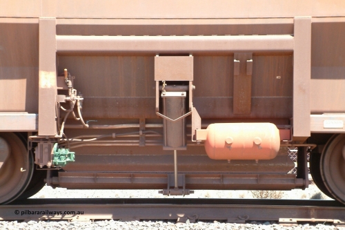8416 Goninan 040409 122000
Boodarie, Goninan built Golynx waggon 8416 with serial number 950088-326 from November 2001, is a modified version of the BHP mainline waggons for service on the Goldsworthy system as a bottom discharge waggon, view of the door and actuator handle. 9th of April 2004.
Keywords: 8416;Goninan-WA;Golynx;950088-326;BHP-ore-waggon;
