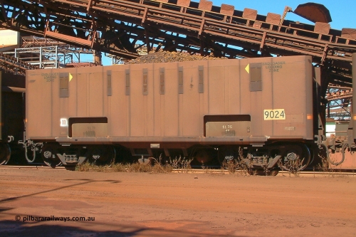 9024 Comeng 030712 143256
Nelson Point, empty BHP ore waggon 9024 with drop belly floor, originally built by Comeng in Mittagong NSW as a part of seven prototype ore waggons made from low carbon 301 stainless steel with an higher volume and aerodynamic flat sides and were bogieless with four independent radial wheel sets. Of the seven waggon, the first four had a flat floor and final three had a drop belly floor. The radial wheel sets were later replaced with conventional bogies. July 12, 2003.
Keywords: 9024;Comeng-NSW;BHP-ore-waggon;