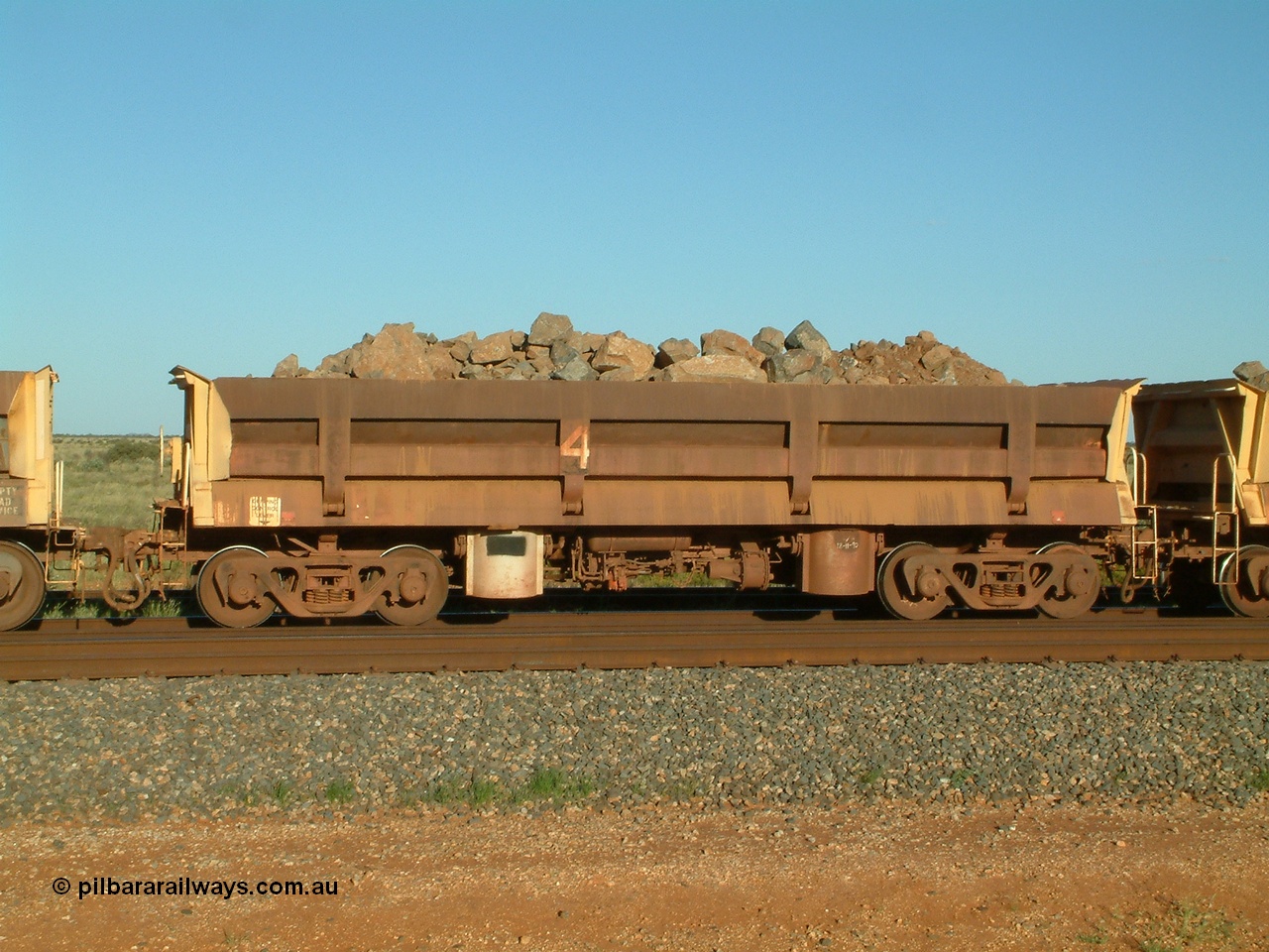 040408 170024
Bing Siding, Difco Ohio USA 1966 built short side dump waggon 4 loaded with rip-rap, originally built for Goldsworthy Mining as no. 4, one five such waggons built for Goldsworthy Mining.
Keywords: Difco-Ohio-USA;GML;BHP-ballast-waggon;