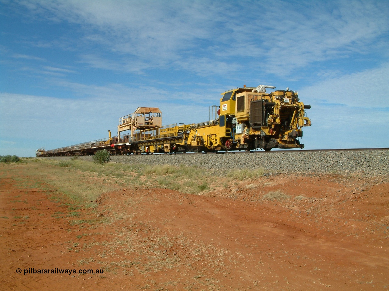 040502 085614
Mooka Siding, trailing view of the 'Pony' heading south, with the Harsco Pony track re-laying machine on the rear.
Keywords: Harsco;BHP-pony-waggon;Pony-Track-Relayer;