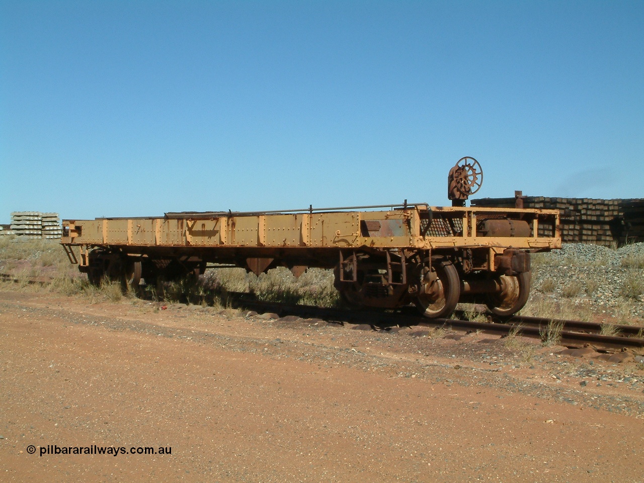 040806 101910
Flash Butt yard, heavily stripped down riveted waggon 206, possible original ballast waggon, number 206 was originally a waggon in the 'Camp Train' and appears to have USA origin, 3/4 view from handbrake end.
