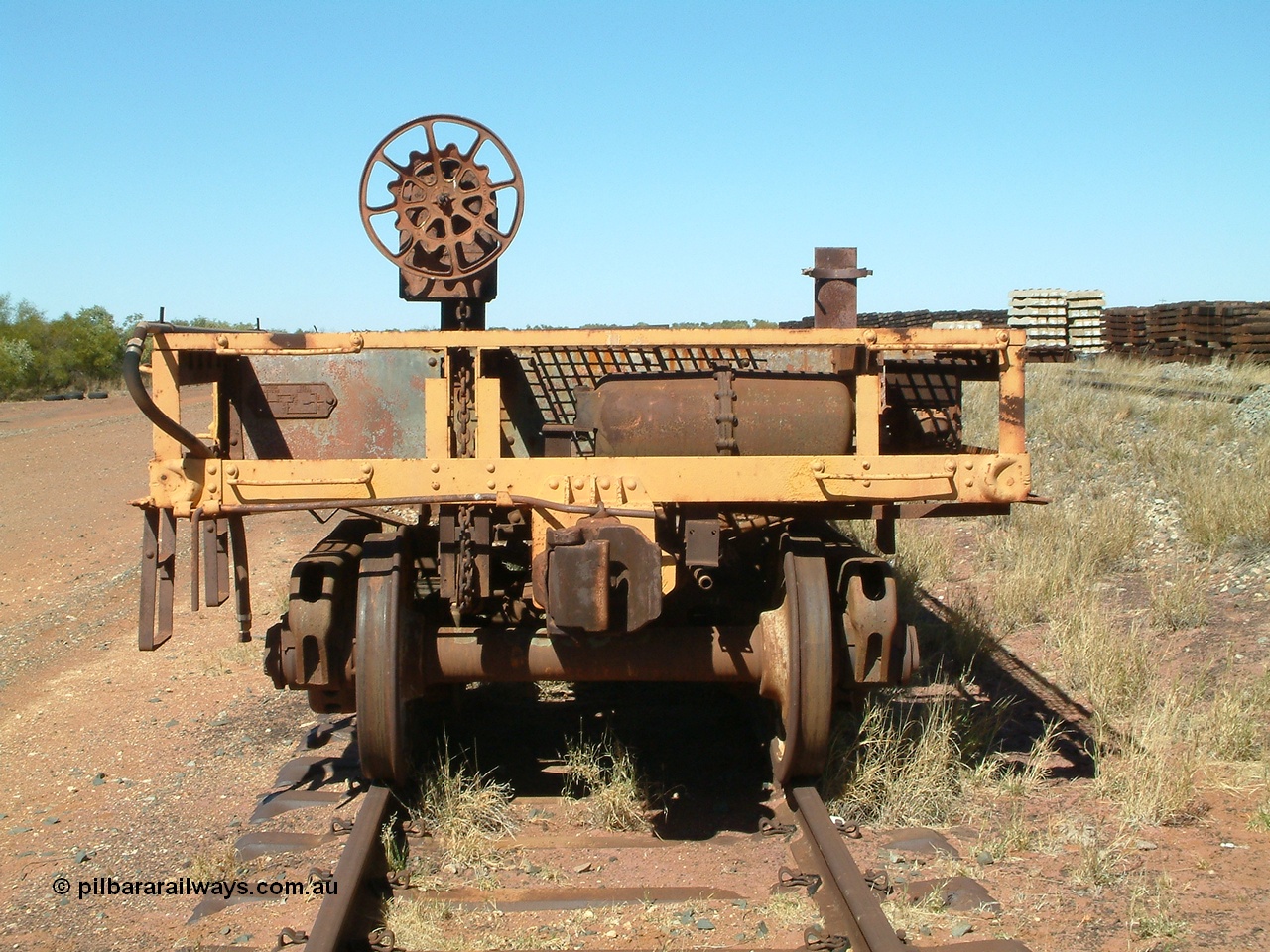 040806 102142
Flash Butt yard, heavily stripped down riveted waggon 206, possible original ballast waggon, number 206 was originally a waggon in the 'Camp Train' and appears to have USA origin, view of handbrake end.
