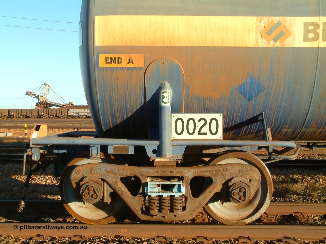 040815 171406
Nelson Point, side view of A end and bogie detail view of fuel tank waggon 0020, 82 kilolitre capacity built by Comeng NSW for BP as RTC 2, used by Mt Newman Mining, unsure when converted to 0020.
Keywords: Comeng-NSW;BP-Oil;RTC2;BHP-tank-waggon;