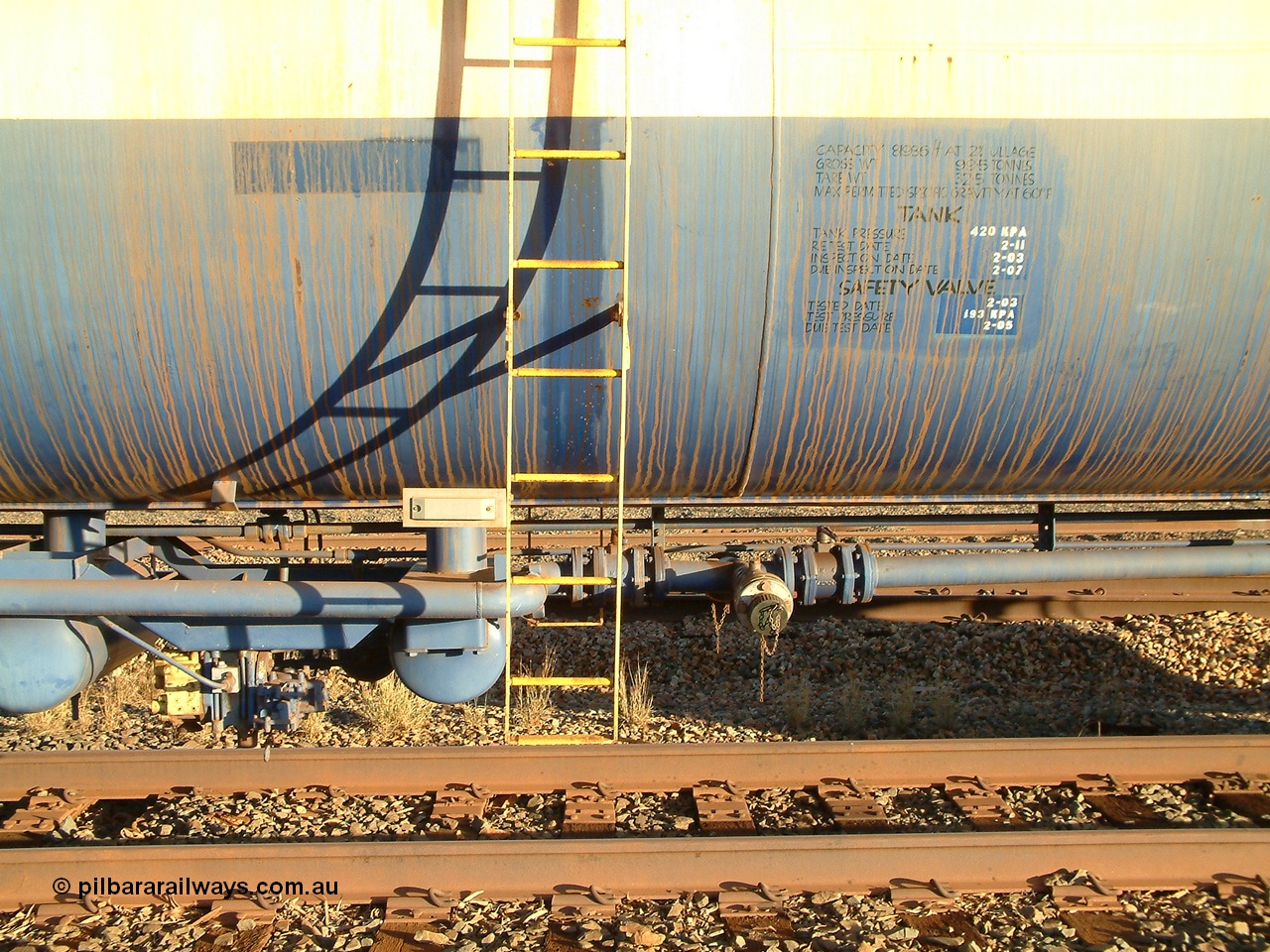 040815 171420
Nelson Point, view of access ladder, brake valve and discharge piping of fuel tank waggon 0020, 82 kilolitre capacity built by Comeng NSW for BP as RTC 2, used by Mt Newman Mining, unsure when converted to 0020.
Keywords: Comeng-NSW;BP-Oil;RTC2;BHP-tank-waggon;