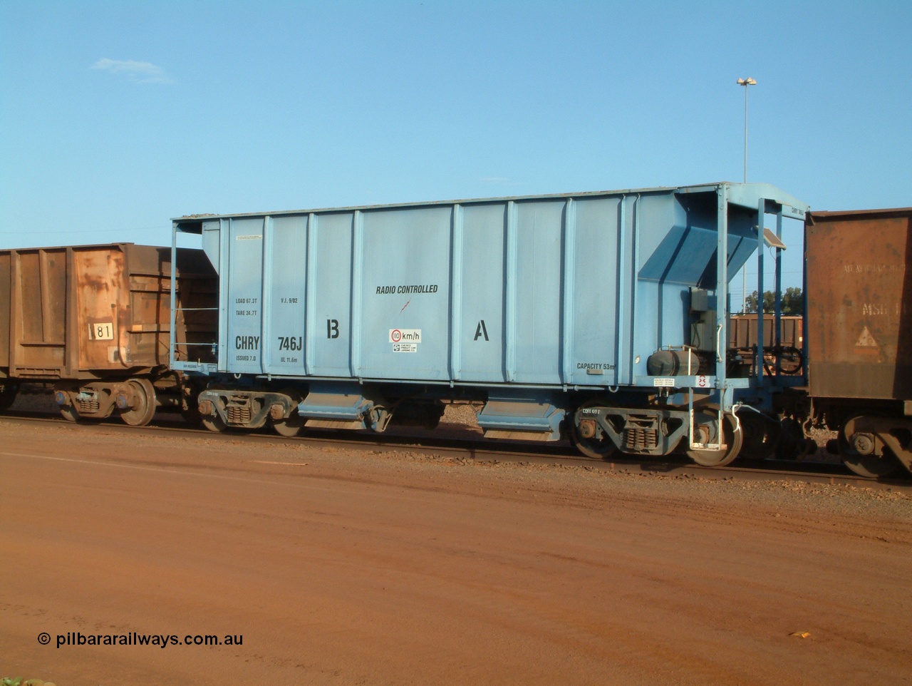 041225 064712
Nelson Point Ore Car Repair Shops, CFCLA leased ballast waggon CHRY type CHRY 746, a fleet of these cars were leased to BHP, and are known as the 'PACE Cars', after the expansion project of the same name. 25th December 2004.
Keywords: CHRY-type;CHRY746;CFCLA;CRDX-type;BHP-ballast-waggon