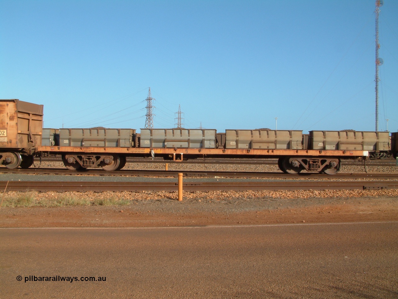 041225 070523
Nelson Point, Ore Car Repair Shop roads, flat waggon no. 5, later renumbered 6705. Originally in service with Goldsworthy Mining as a BC or BCV box van, built by Comeng WA in 1966.
Keywords: Comeng-WA;GML;BC-type;BHP-Flat-Waggon