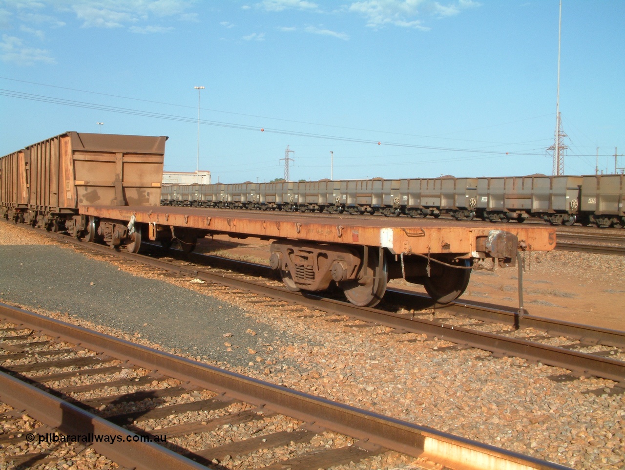 041225 070554
Nelson Point, Ore Car Repair Shop roads, flat waggon no. 5, later renumbered 6705. Originally in service with Goldsworthy Mining as a BC or BCV box van, built by Comeng WA in 1966.
Keywords: Comeng-WA;GML;BC-type;BHP-Flat-Waggon