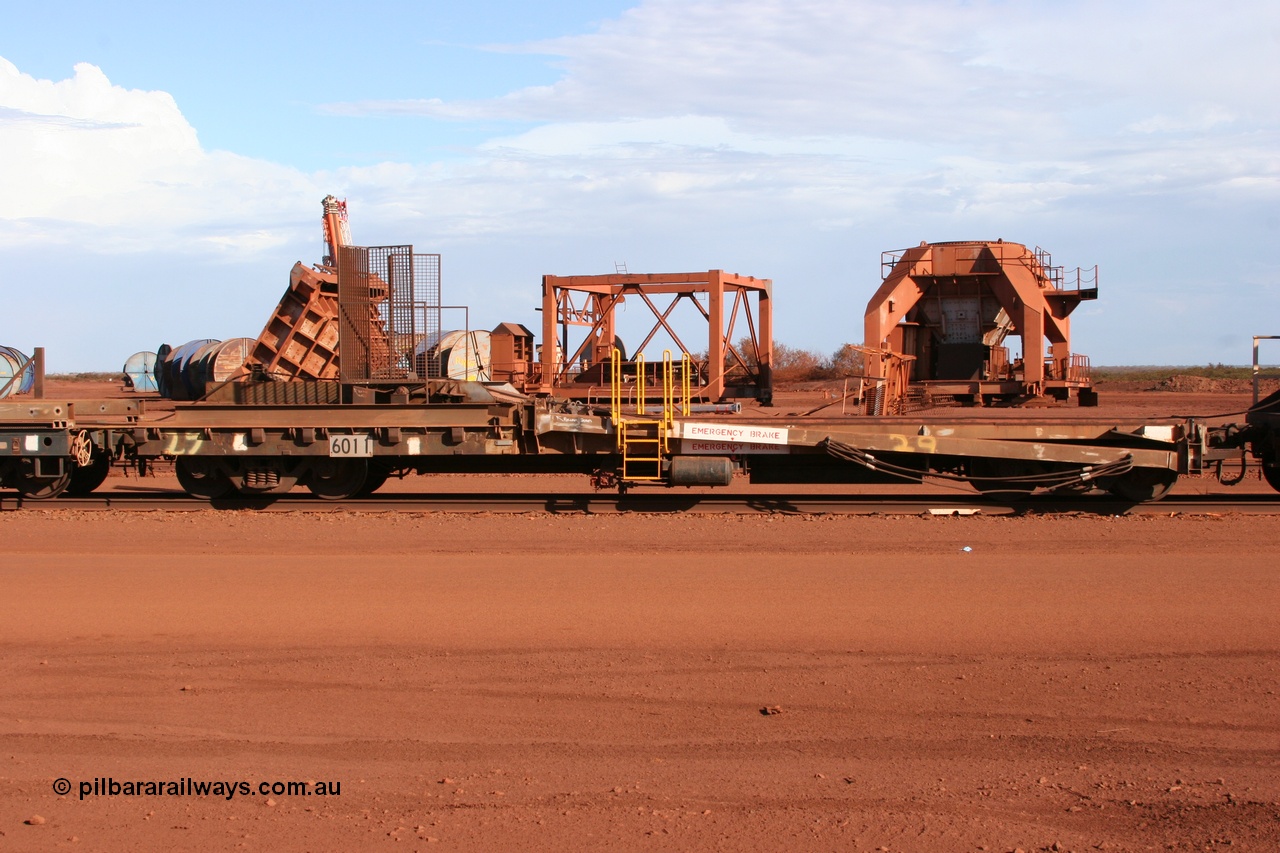 050319 0144
Nelson Point, rail recovery and transport train, 1st lead off waggon 6011, built by Scotts of Ipswich 04-09-1970, the mesh guarding is for the winch cable. The chute arrangement for the discharging and recovery of rail is visible.
Keywords: Scotts-Qld;BHP-rail-train;