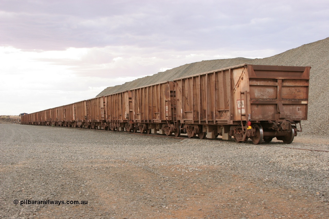 050412 0778
Quarry 8 loading area, view from rear of train with Magor USA built ballast rake.
Keywords: Magor-USA;BHP-ballast-waggon;