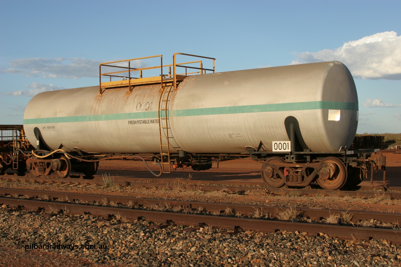 050414 0943
Flash Butt yard, Comeng NSW built 82 kilolitre water tank waggon 0001, one of two such tank waggons built in November 1970.
Keywords: Comeng-NSW;BHP-tank-waggon;