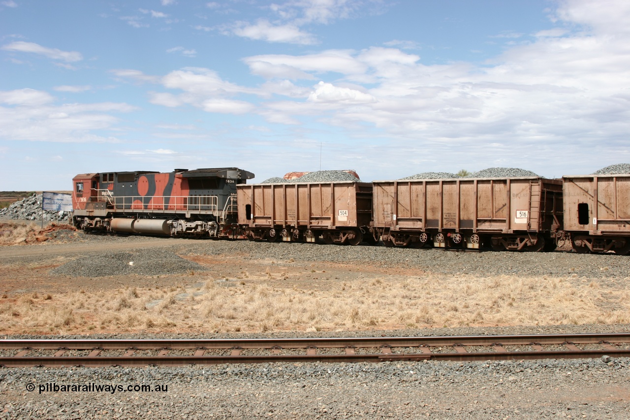 050421 1383
Quarry 8, Shaw Siding area, Dash 8 unit 5636 shunts the loaded ballast rake under the water point on the south leg of the triangle. Original Magor USA built ballast cars 516 and 504 dating from a 1963 build.
Keywords: Magor-USA;BHP-ballast-waggon;