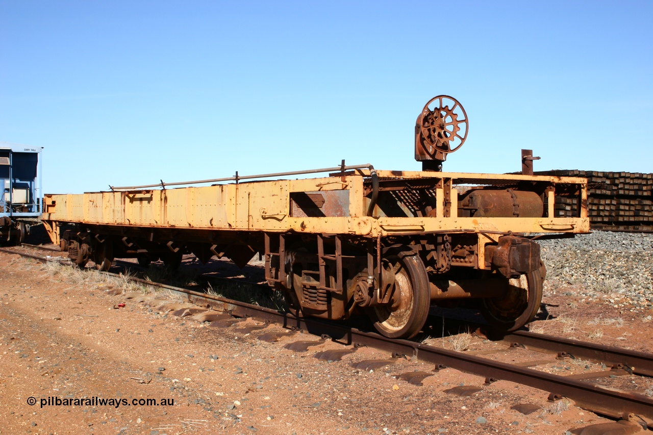 050518 2120
Flash Butt yard, heavily stripped down riveted waggon 206, possible original ballast waggon, number 206 was originally a waggon in the 'Camp Train' and appears to have USA origin, 3/4 view from handbrake end.
Keywords: BHP-flat-waggon;