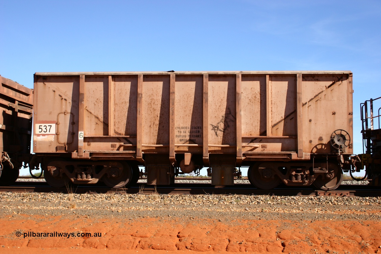 050518 2156
Bing Siding. Side view of 1963 built Magor USA waggon 537, originally in ore service before conversion to a ballast waggon.
Keywords: Magor-USA;BHP-ballast-waggon;