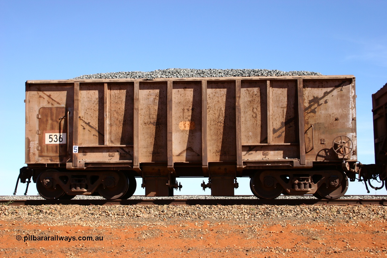 050518 2199
Bing Siding. Side view of 1963 built Magor USA waggon 536, originally in ore service before conversion to a ballast waggon.
Keywords: Magor-USA;BHP-ballast-waggon;