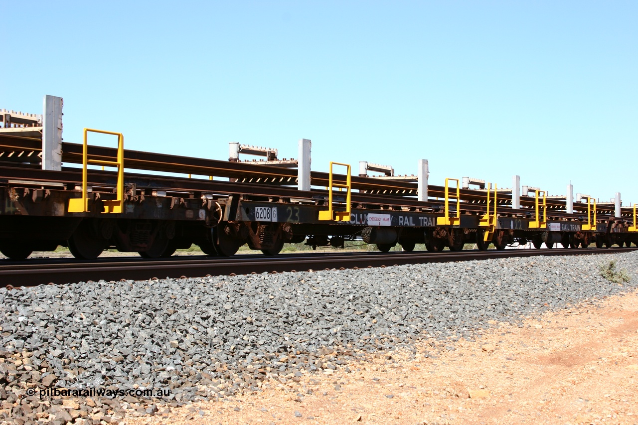 050525 2991
Mooka Siding, rail recovery and transport train flat waggon #23, 6208, built by Comeng WA in February 1977 under order number 07-M-282 RY.
Keywords: Comeng-WA;BHP-rail-train;