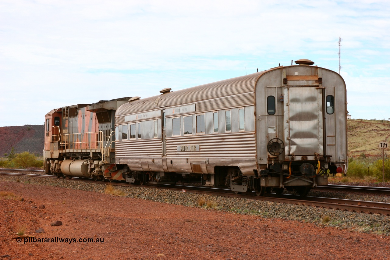 050624 3330
Goldsworthy, train end and hand brake of the Sundowner coach, originally built by E. G. Budd in 1939 numbered 301 as the Silver Star as a diner-parlour-observation coach on the Chicago, Burlington and Quincy Railroad's General Pershing Zephyr train from the 1930s and 1940s. Donated to Mt Newman Mining Co. by AMAX an original joint venture partner to commemorate the projects first 100 million tonnes of iron ore railed between Mount Whaleback mine and the Port Hedland port.
Keywords: Silver-Star;EG-Budd;Sundowner;General-Pershing-Zephyr;301;