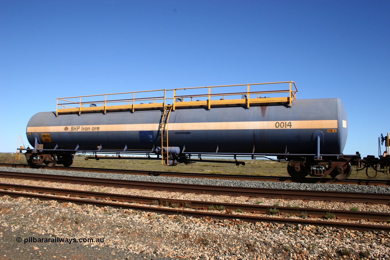 050704 3995
Bing Siding, empty 116 kL Comeng WA built tank waggon 0014 from 1974-5, one of six such tank waggons.
Keywords: Comeng-WA;BHP-tank-waggon;